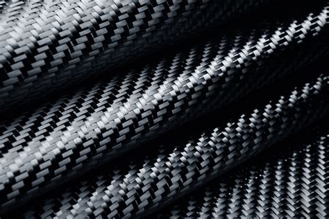  Carbon Fiber: Käyttötarkoitus ja Tuotanto - Voiko tämä materiaali Todella Muuttaa Maailmaa?